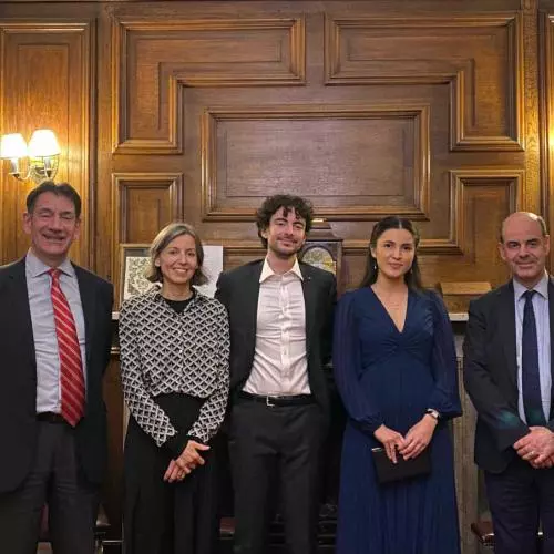 Collette Pakuza and Carlo Mussolini celebrate defending their theses