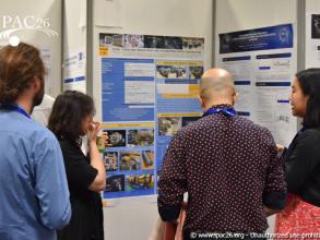 Sasha Horney explaining her poster to IPAC delegates